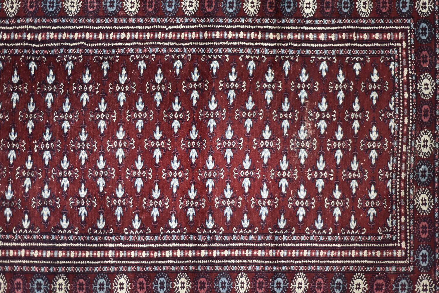 Handwoven red Boukhara oriental rug, 1960s