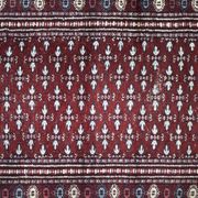 Tapis oriental Boukhara rouge tissé à la main, années 1960