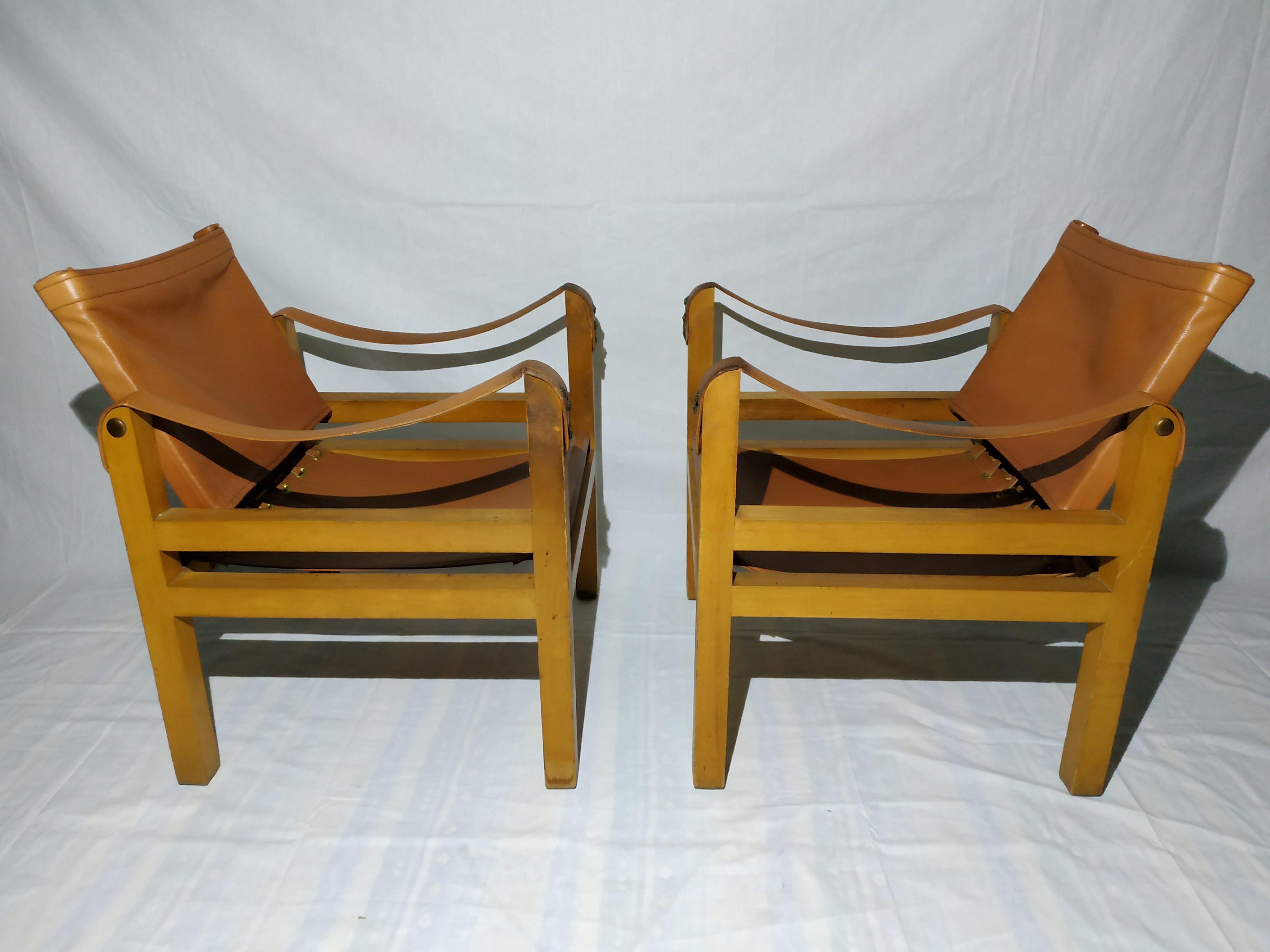 Pair of safari leather armchairs 50s