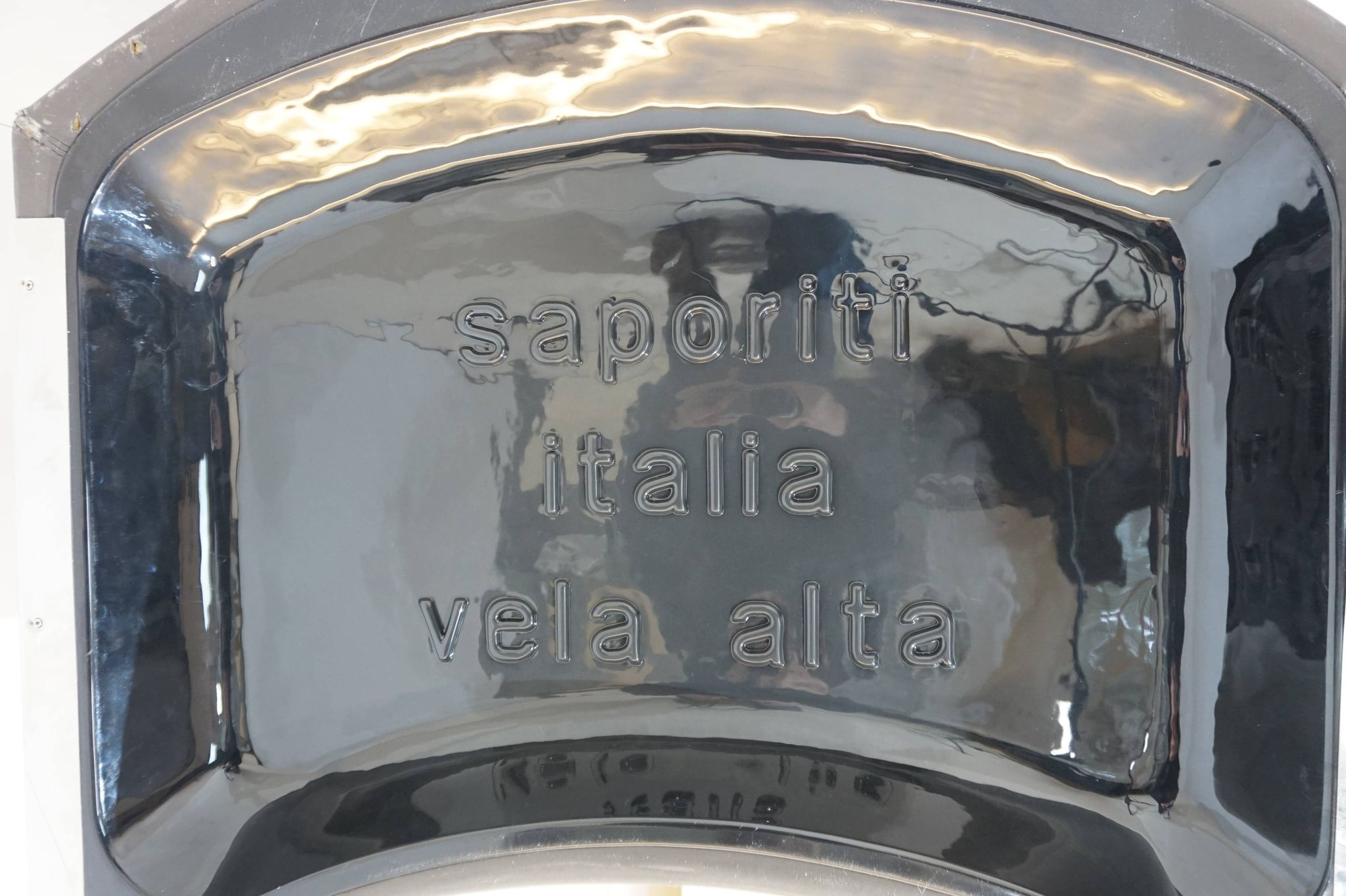 Saporiti Vela Alta leather armchair with ottoman by Giovanni Offredi