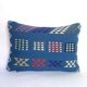 woven velvet cushion, very lively thanks to its bright colours.