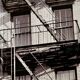 Photo New York 1953 – Fire escape & woman at the window