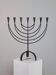 Vintage Swedish Menorah candle holder, hand-forged, in brutalist style.