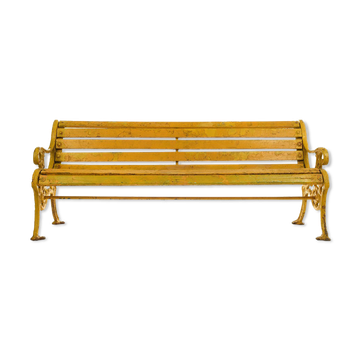 Banc en bois et fonte à patine jaune