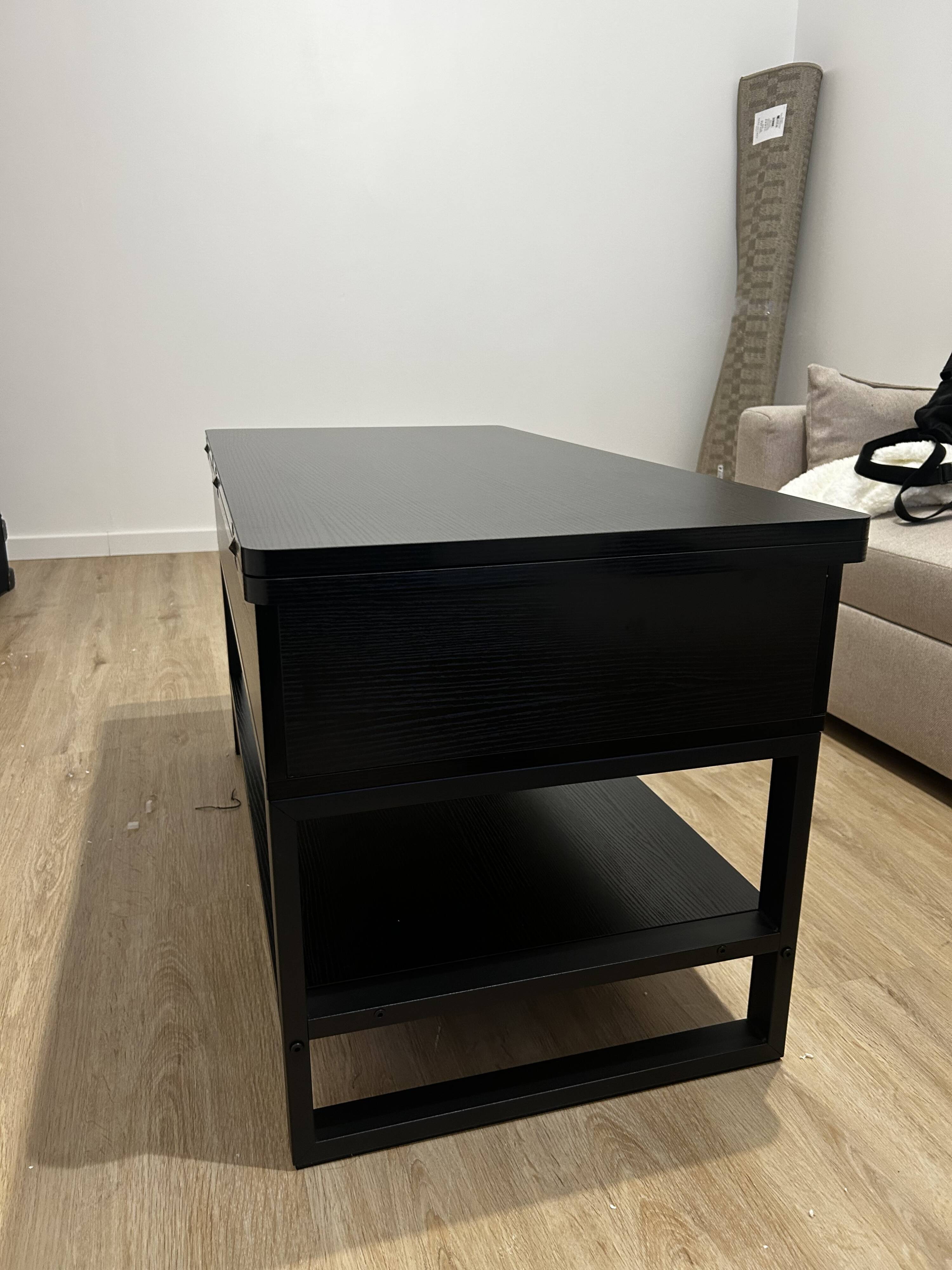 Black lift-top coffee table - Space-saving