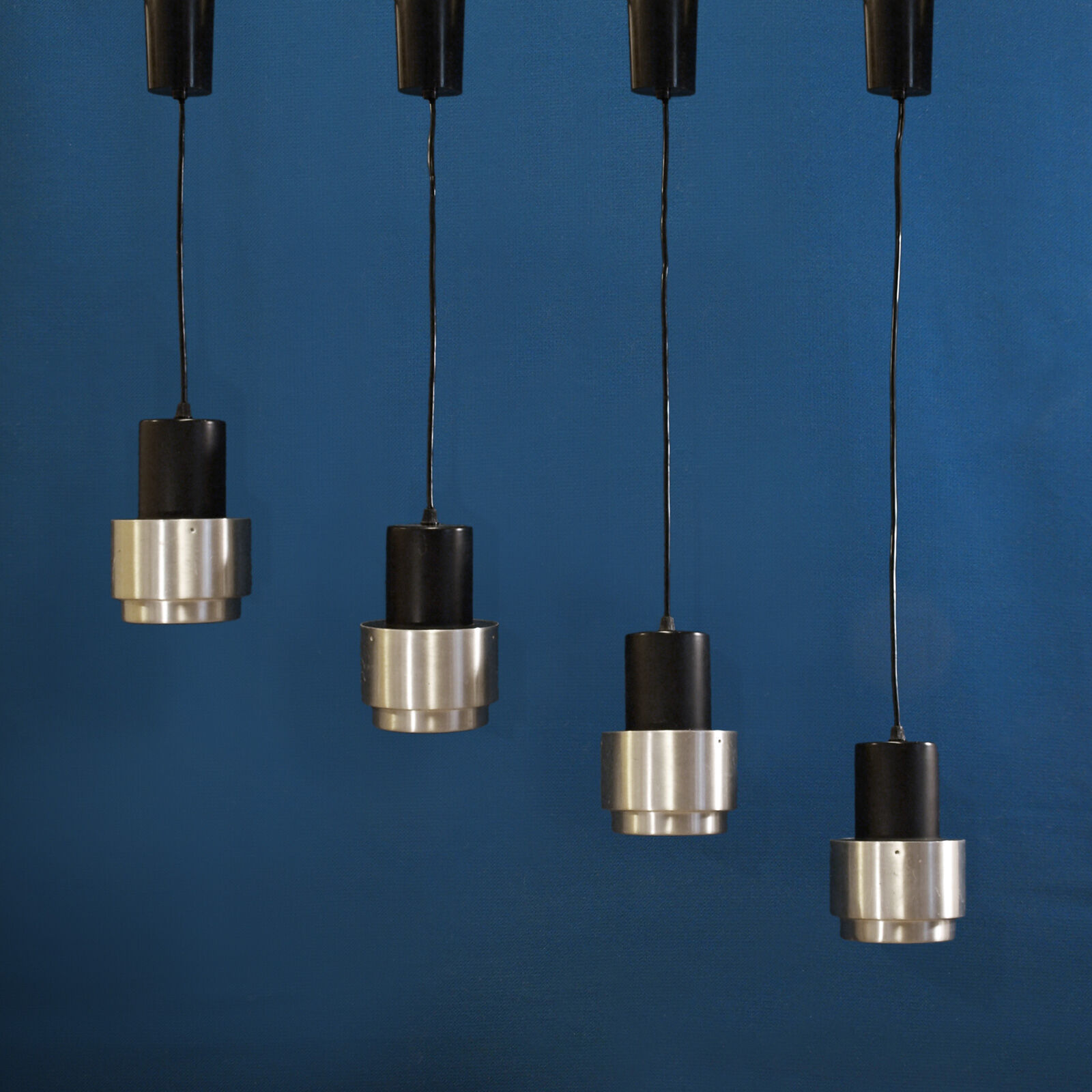 Suite de 4 suspensions space age en inox brossé