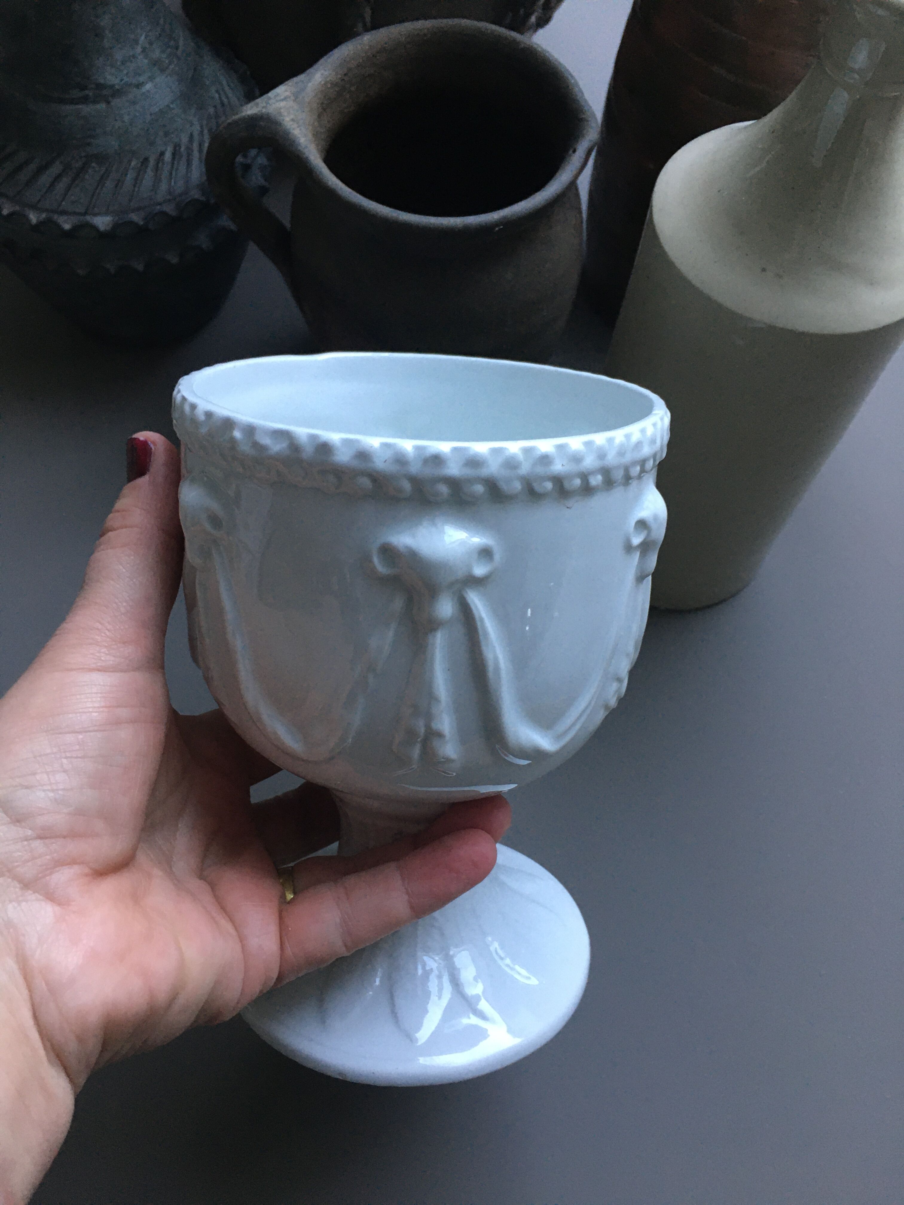 White chalice-cutting vase