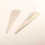 Minimalist triangular salad serving spoons by Jumbo.