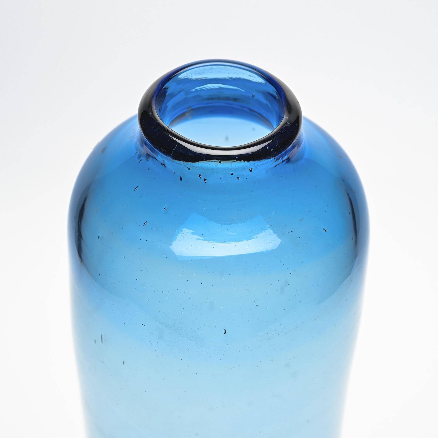 Cylindrical vase in light blue glass by Claude Morin, circa 1975