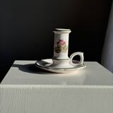 Small vintage hand-held candlestick in earthenware with green trim and floral decoration H10.5