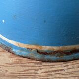 Old pitcher or milk jug in painted sheet metal
