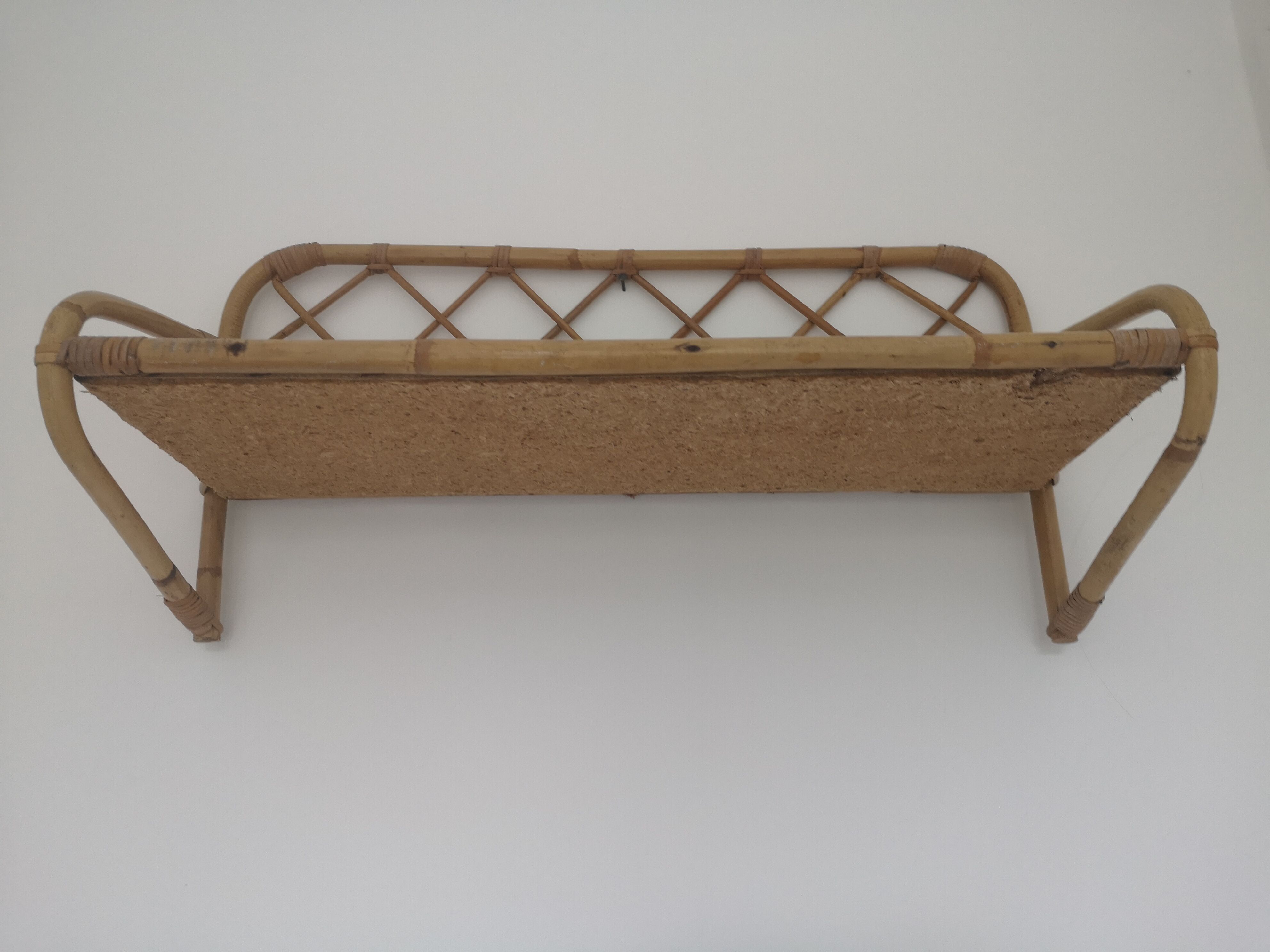 Rattan wall shelf