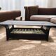 Vintage glass coffee table with dark wood frame