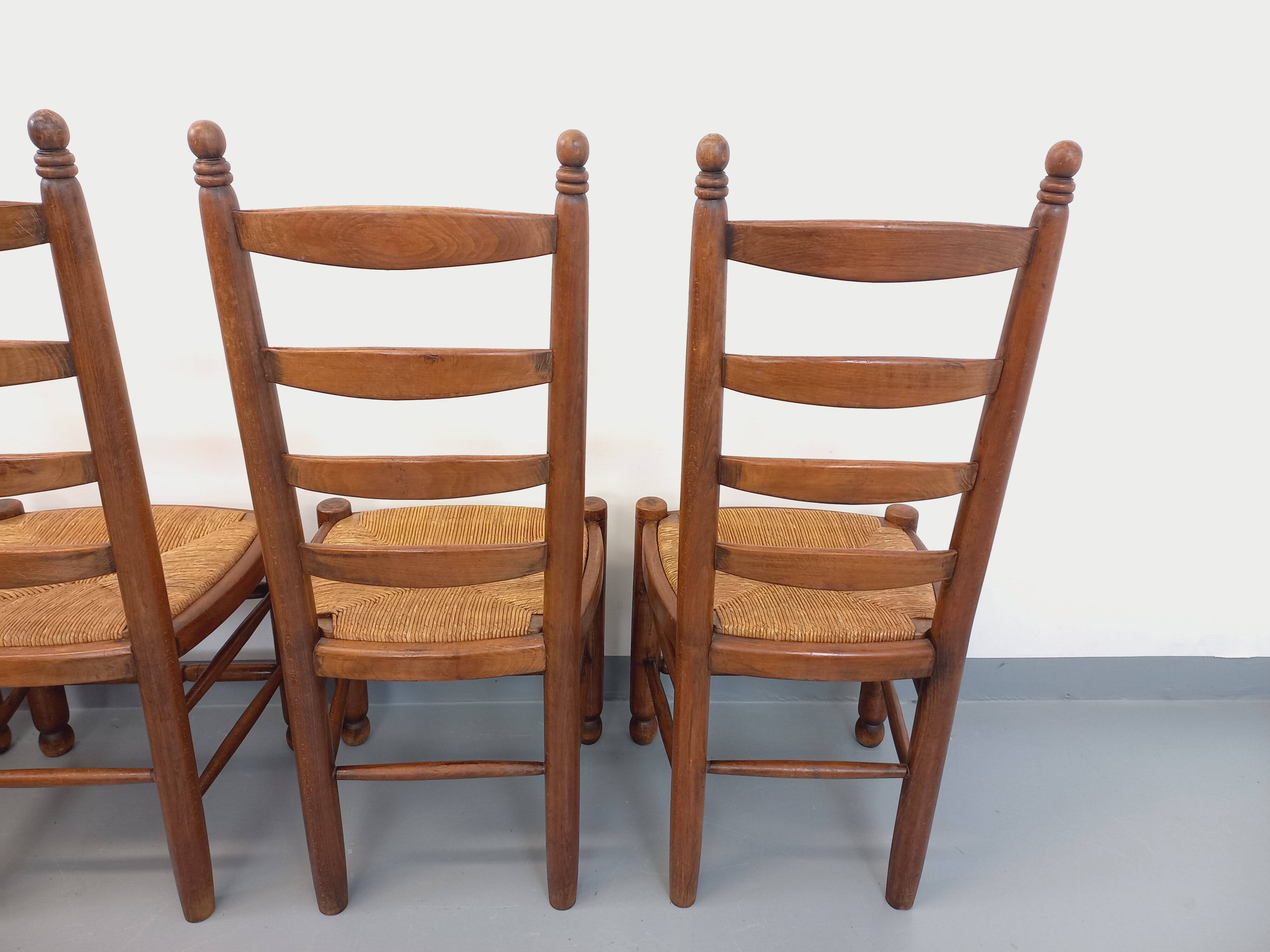 Set of 4 vintage brutalist Charles Dudouyt chairs in wood and straw from the 60s