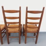 Set of 4 vintage brutalist Charles Dudouyt chairs in wood and straw from the 60s