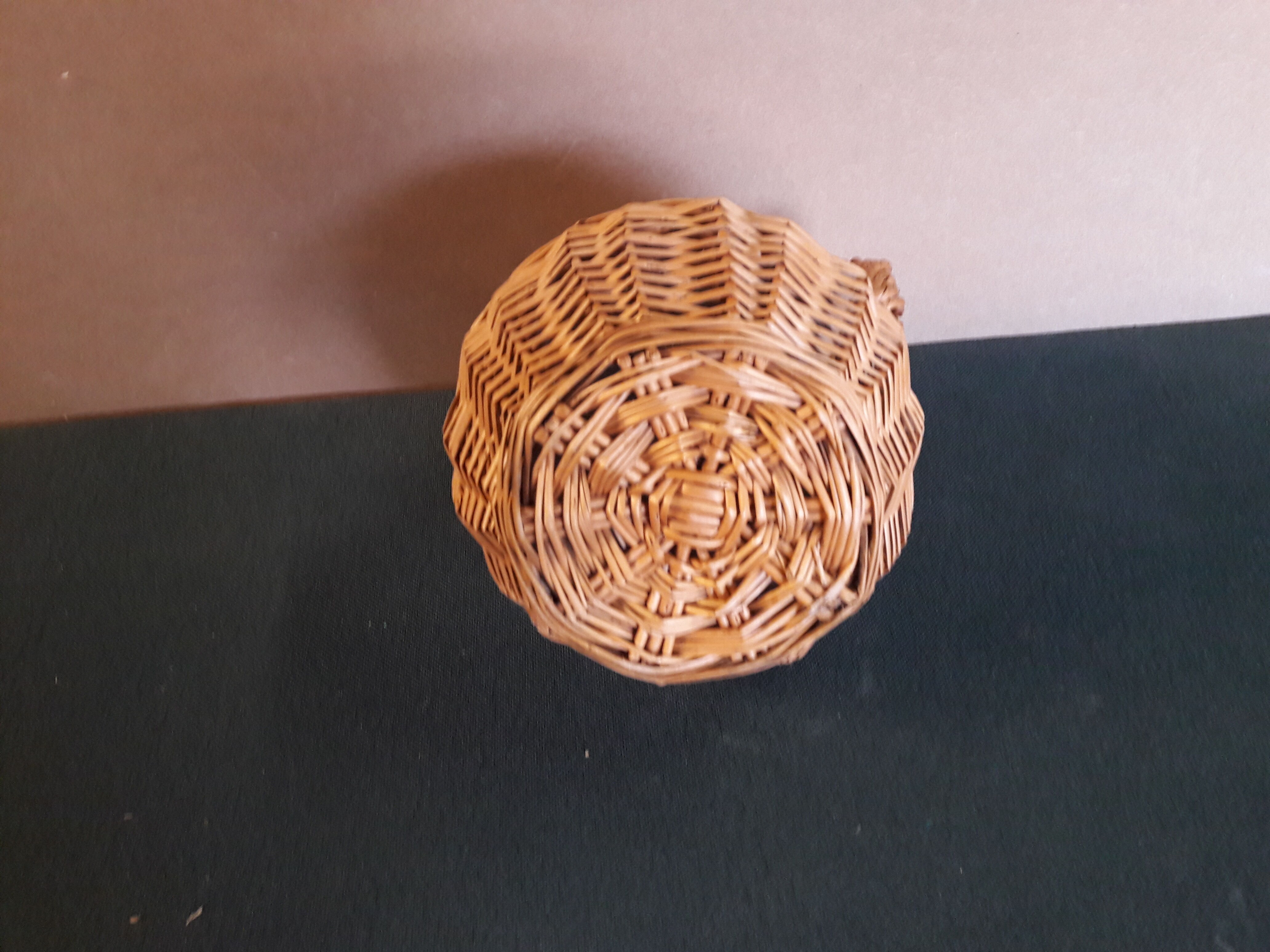 Lady Jeanne surrounded by wicker