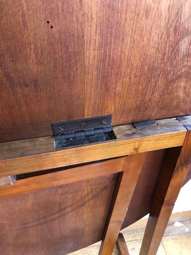 A folding table in cherry tree called a winemaker