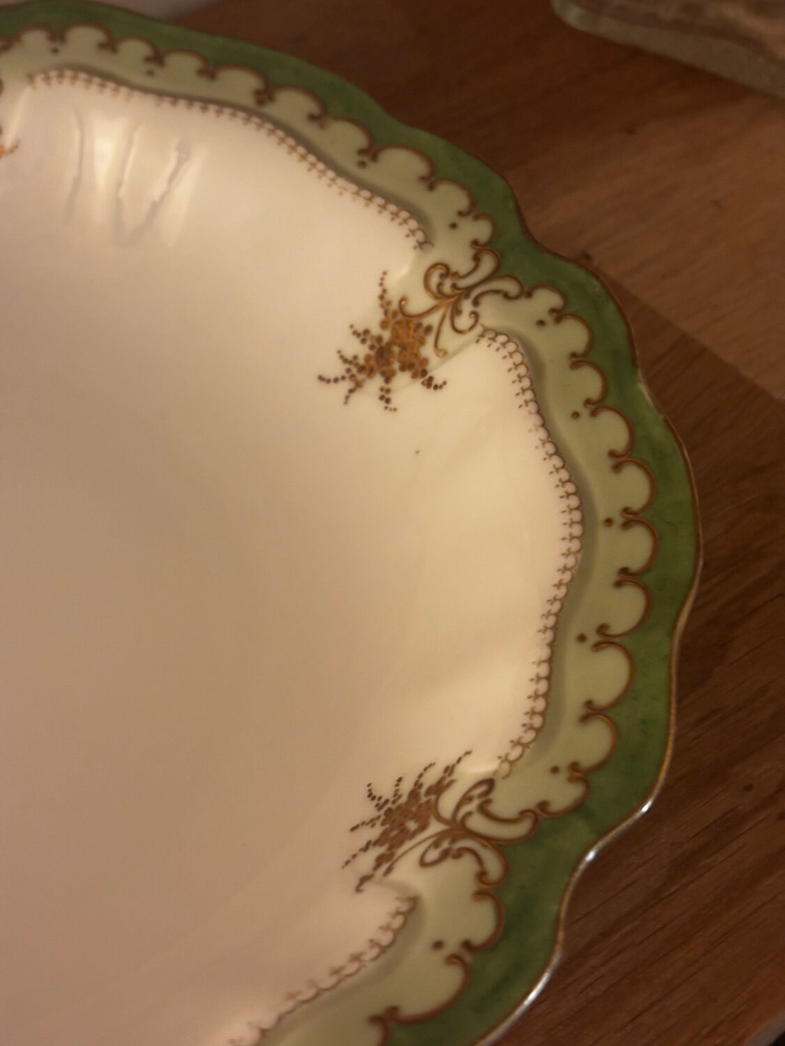 Green Limoges porcelain serving dish with gilt trim