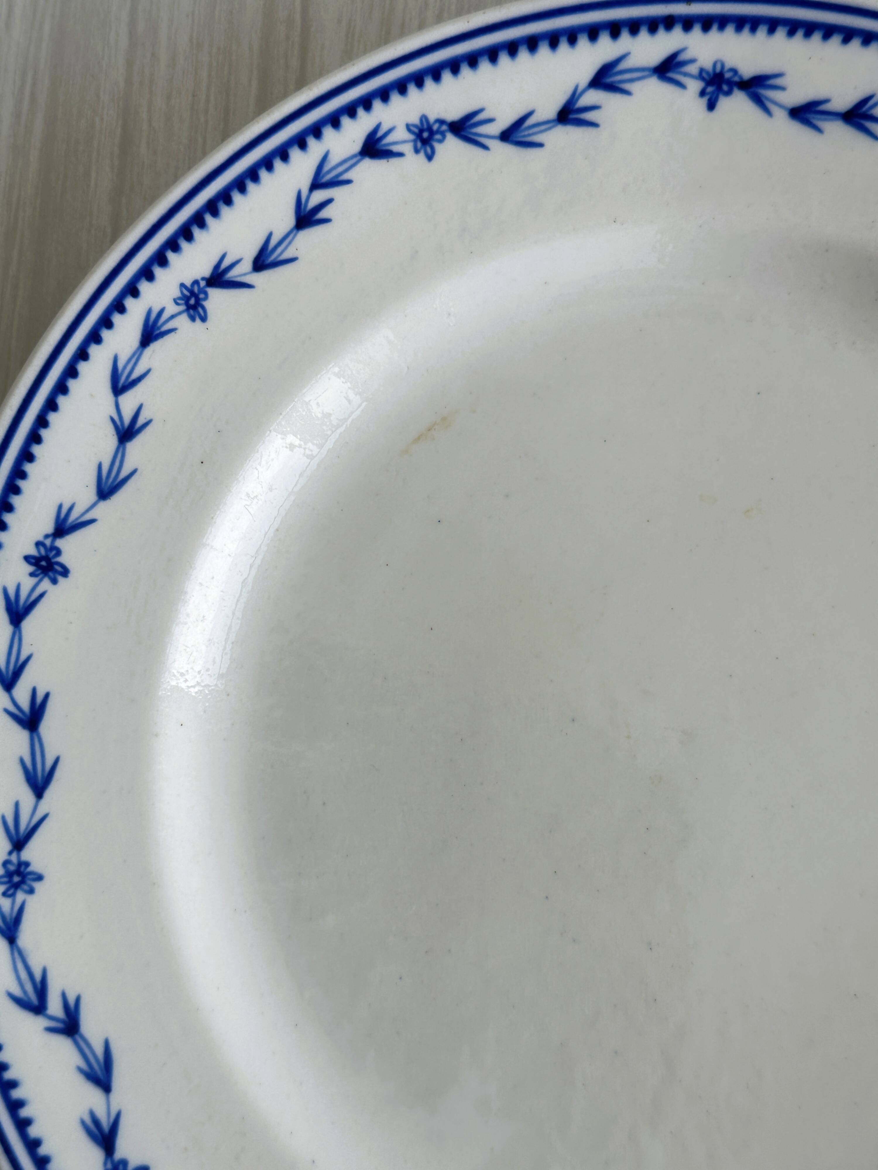 4 antique ceramic plates with blue flowers