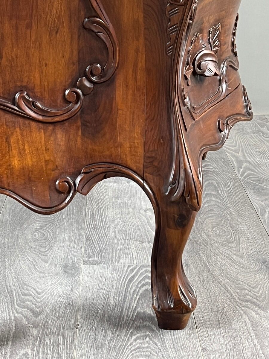 Curved commode in the Louis XV style, carved wood, 19th century.