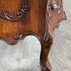 Curved commode in the Louis XV style, carved wood, 19th century.