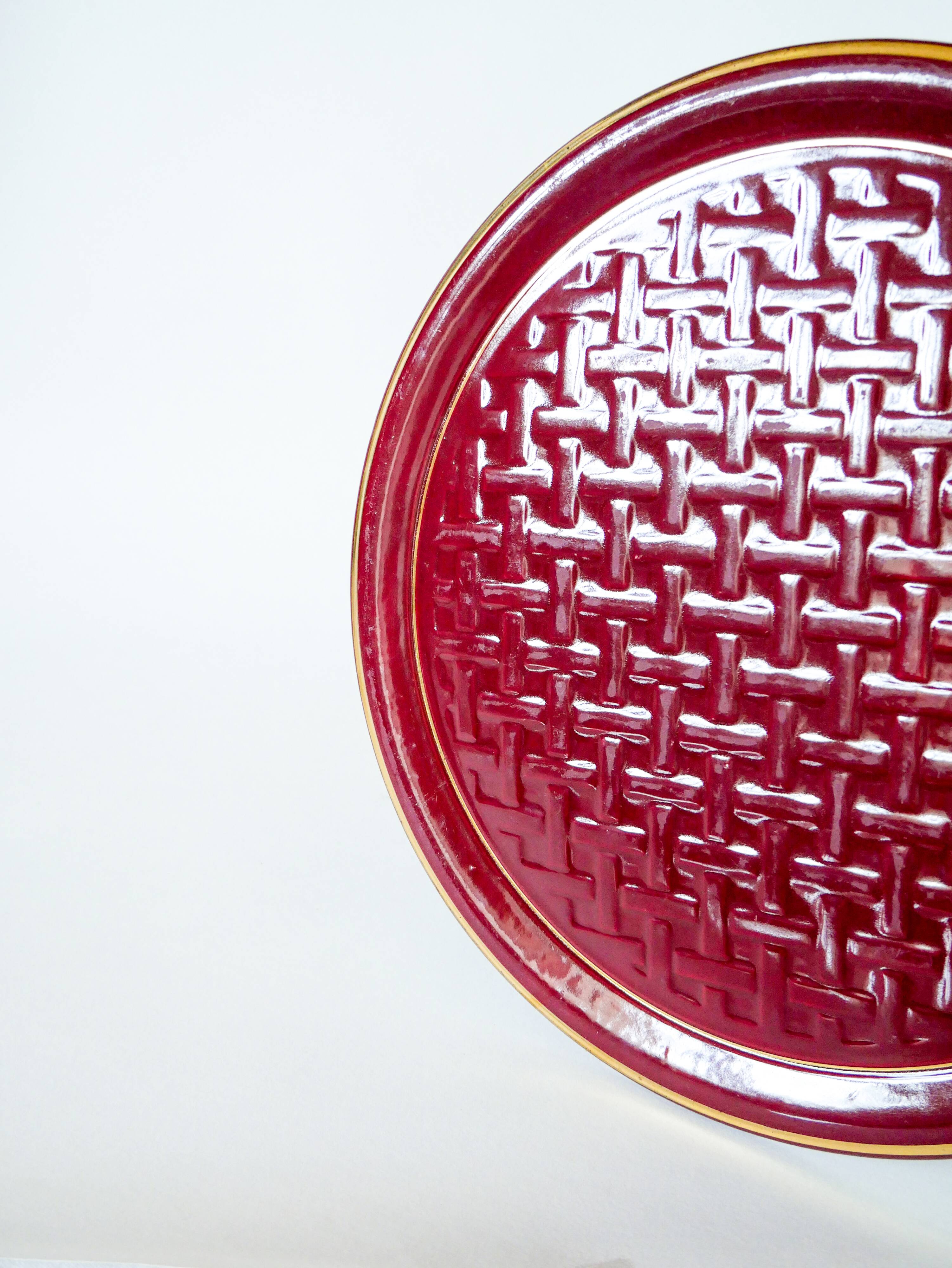 Large burgundy barbotine ceramic cake dish with braided effect 1960