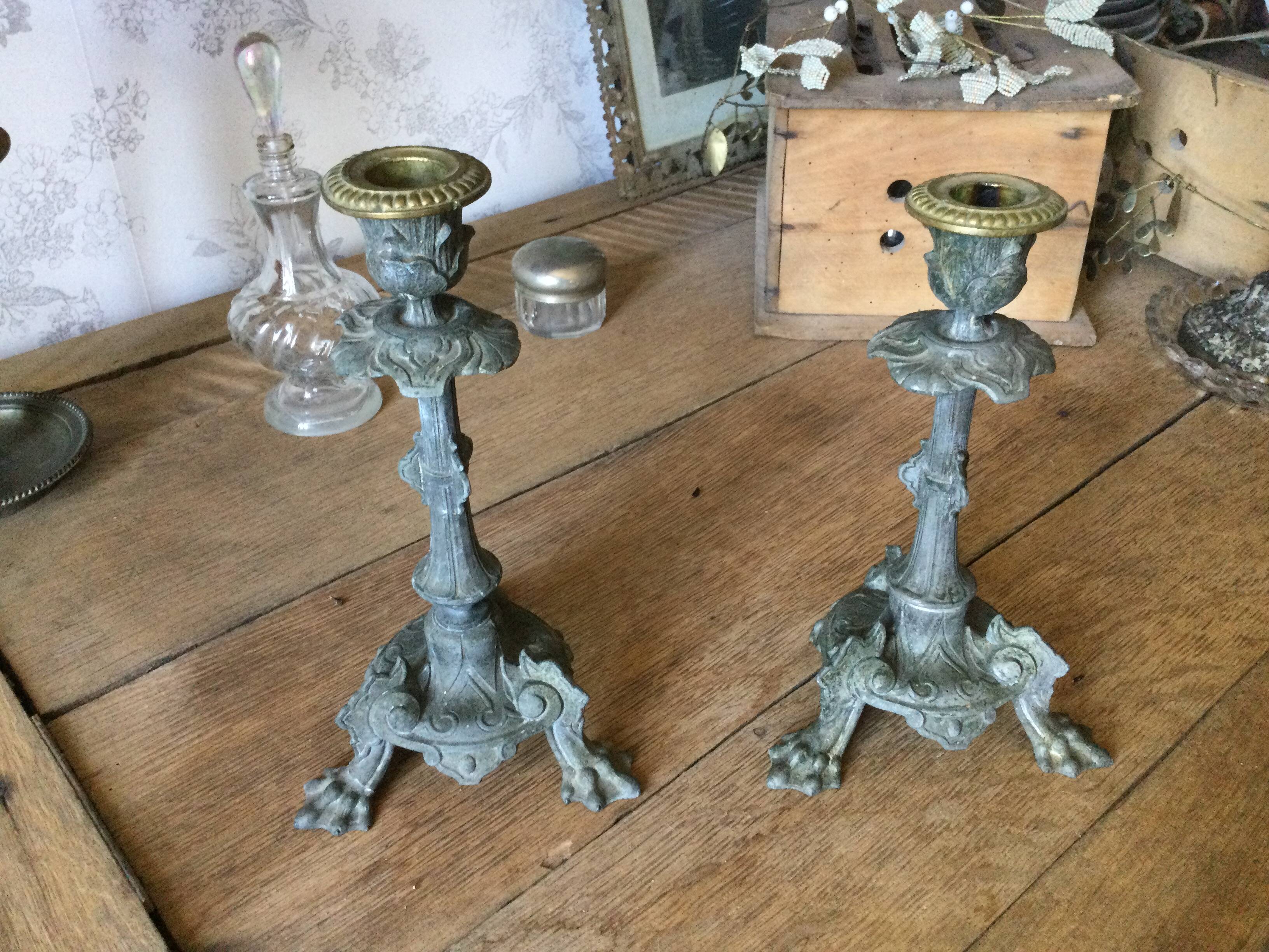 Set of 2 antique candlesticks in spelter.