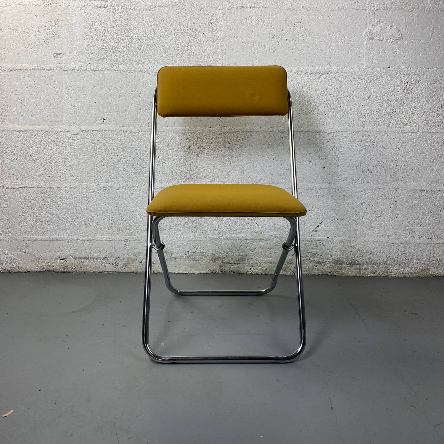 Mustard yellow folding chair