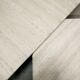 Series of 2 vintage travertine coffee tables published by Roche Bobois