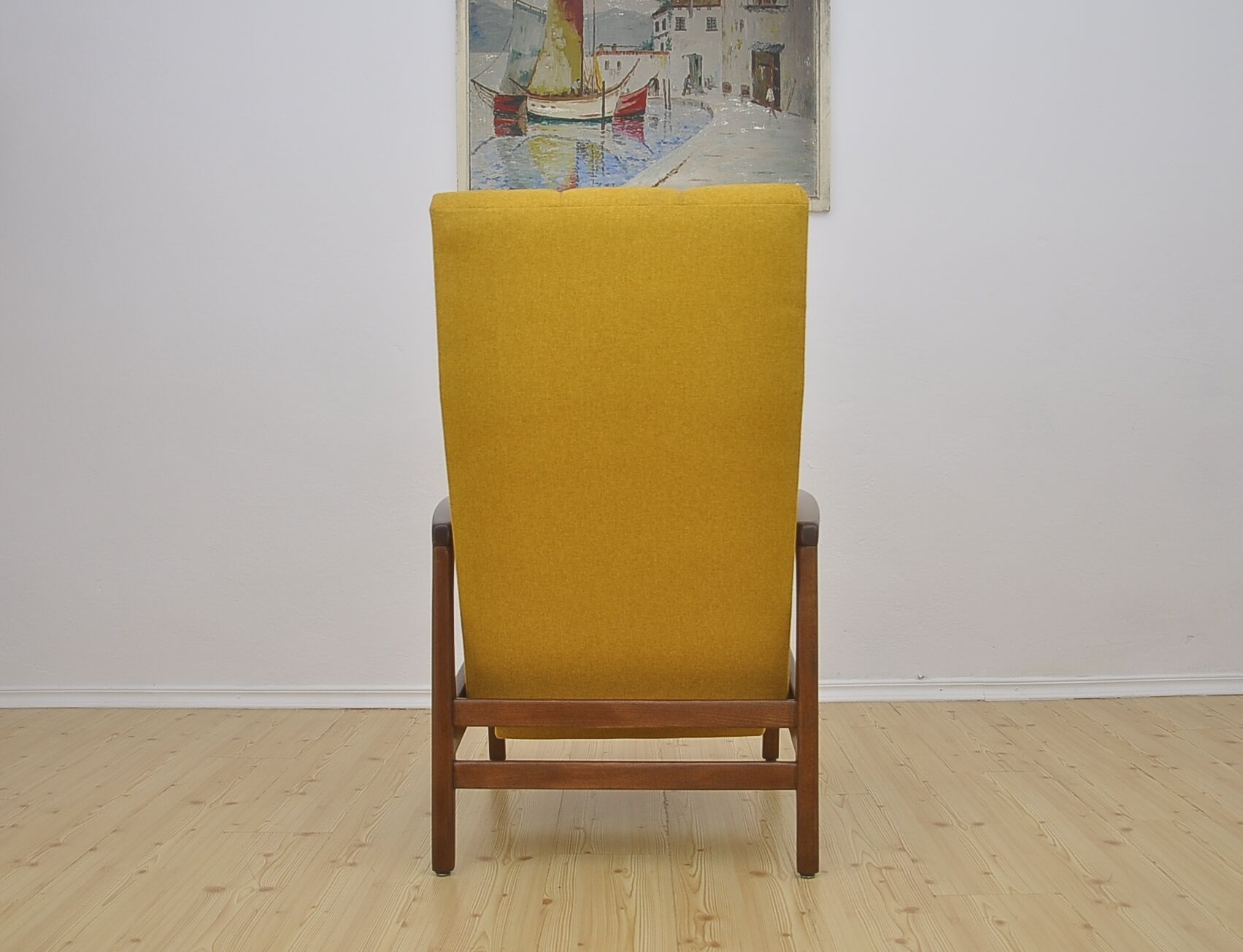 Mid-century armchair with folding footrest, 1960s
