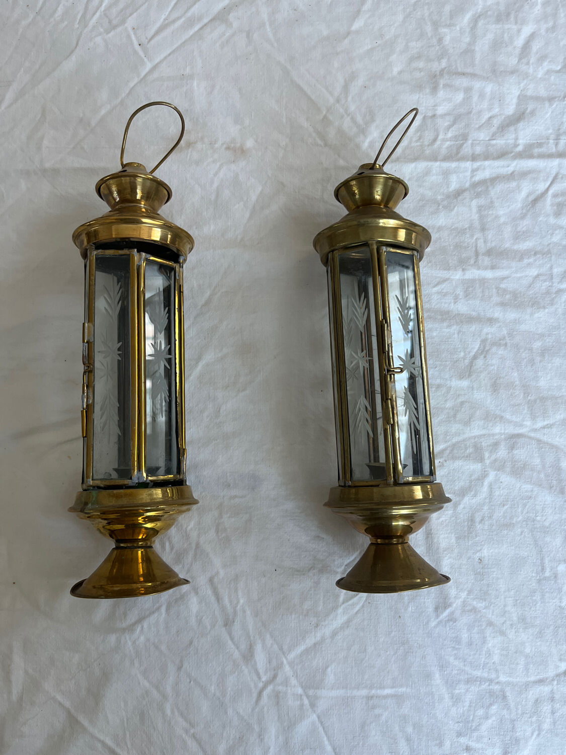 2 brass lanterns