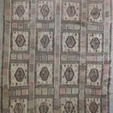Antique embroidered kilim with 16 medallions from Turkey or the Balkans, c. 1950.