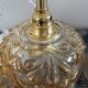 Set of two suspensions in gilded chiseled glass