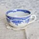 Antique blue and white earthenware teacup - Floral decoration