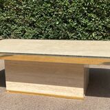 Vintage coffee table in travertine and brass.