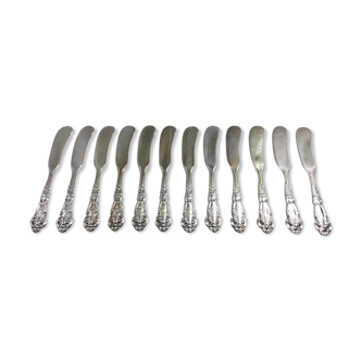 Series of 12 silver butter knives