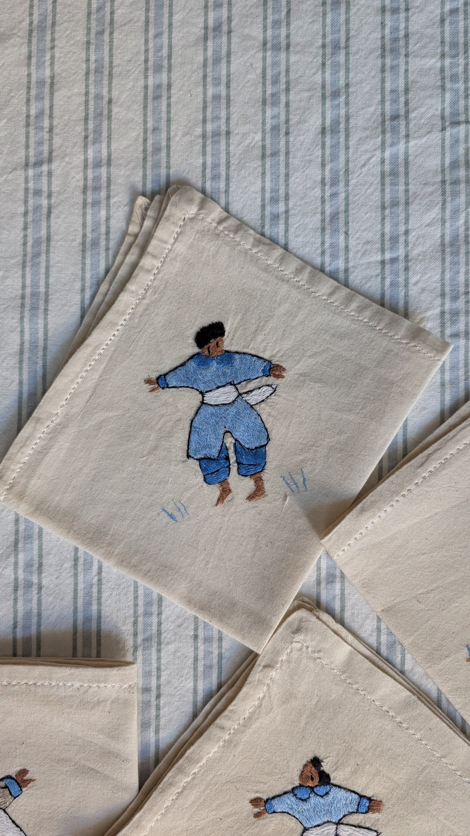Set of 6 embroidered character napkins