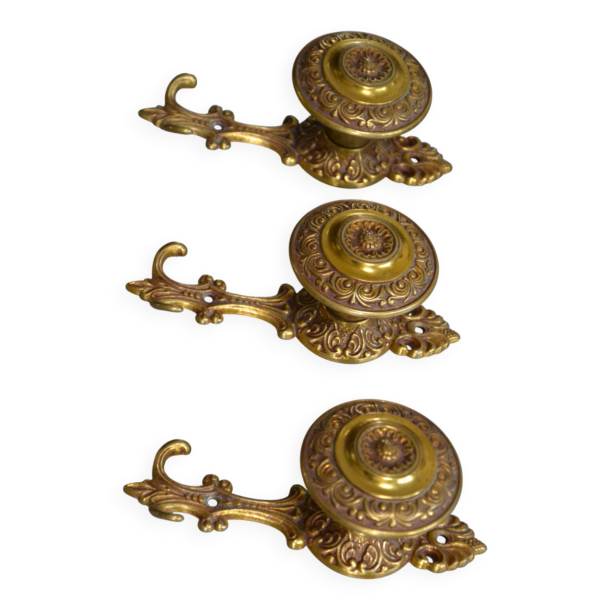 Three coat hooks with brass hook