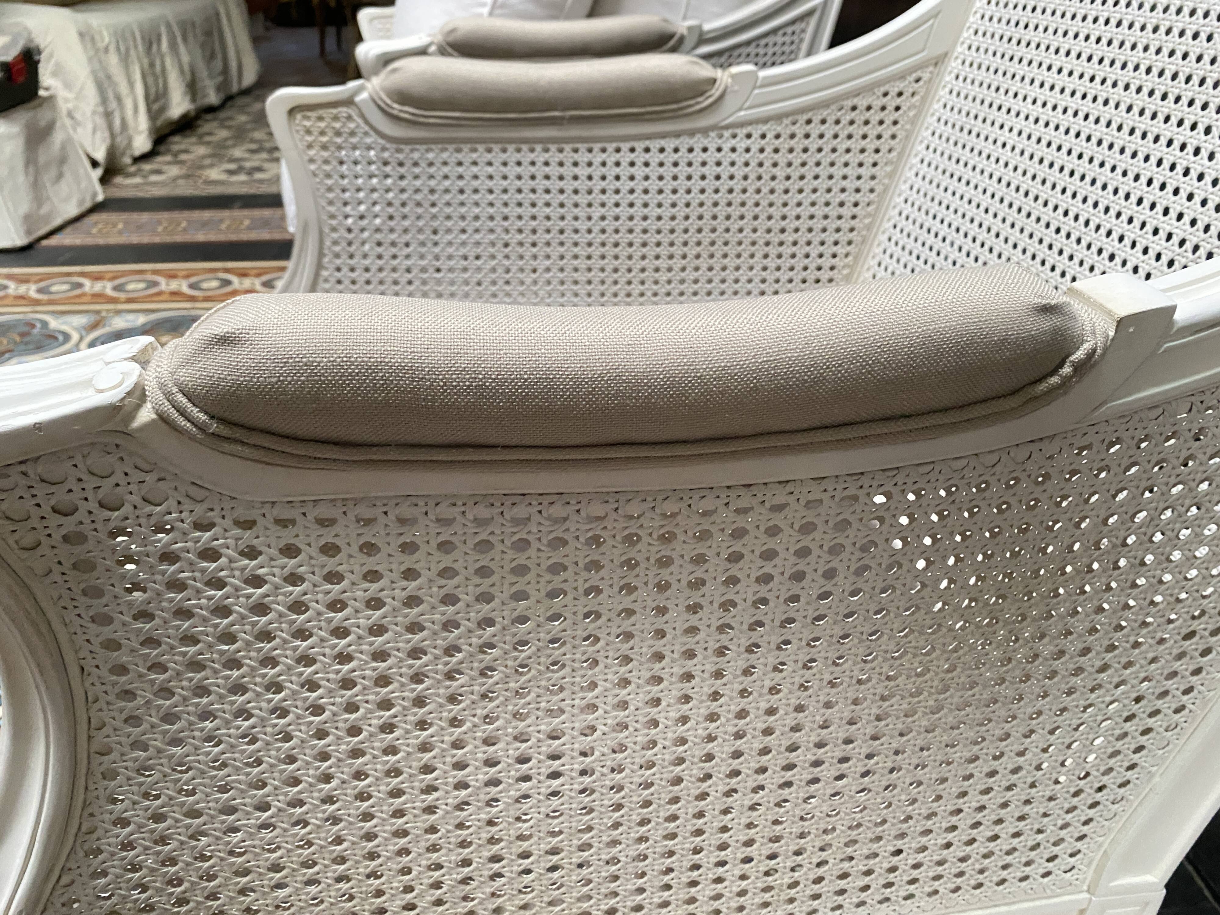 Pair of Louis XVI style caned Bergère armchairs