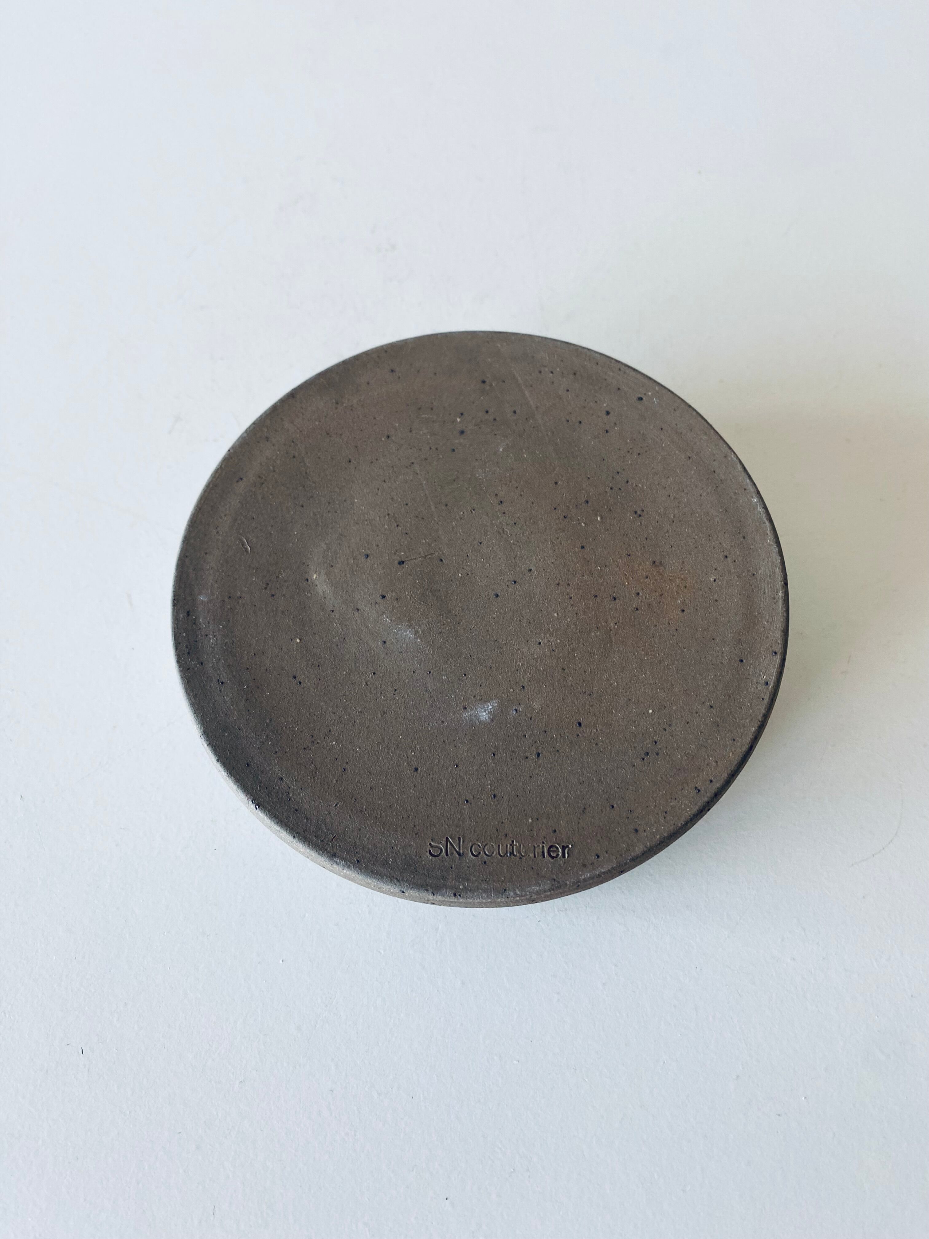 Stoneware ashtray signed Couturier