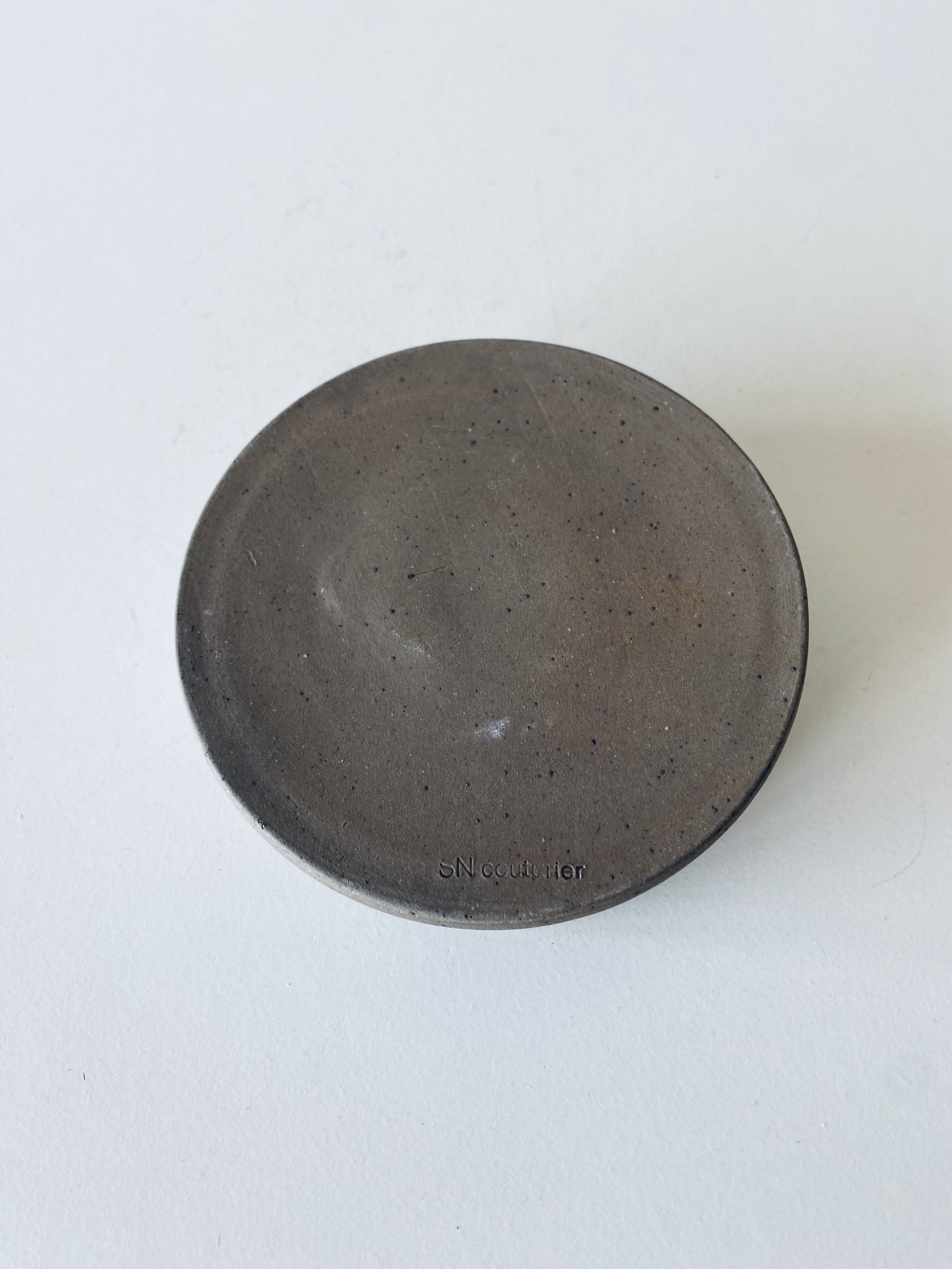 Stoneware ashtray signed Couturier