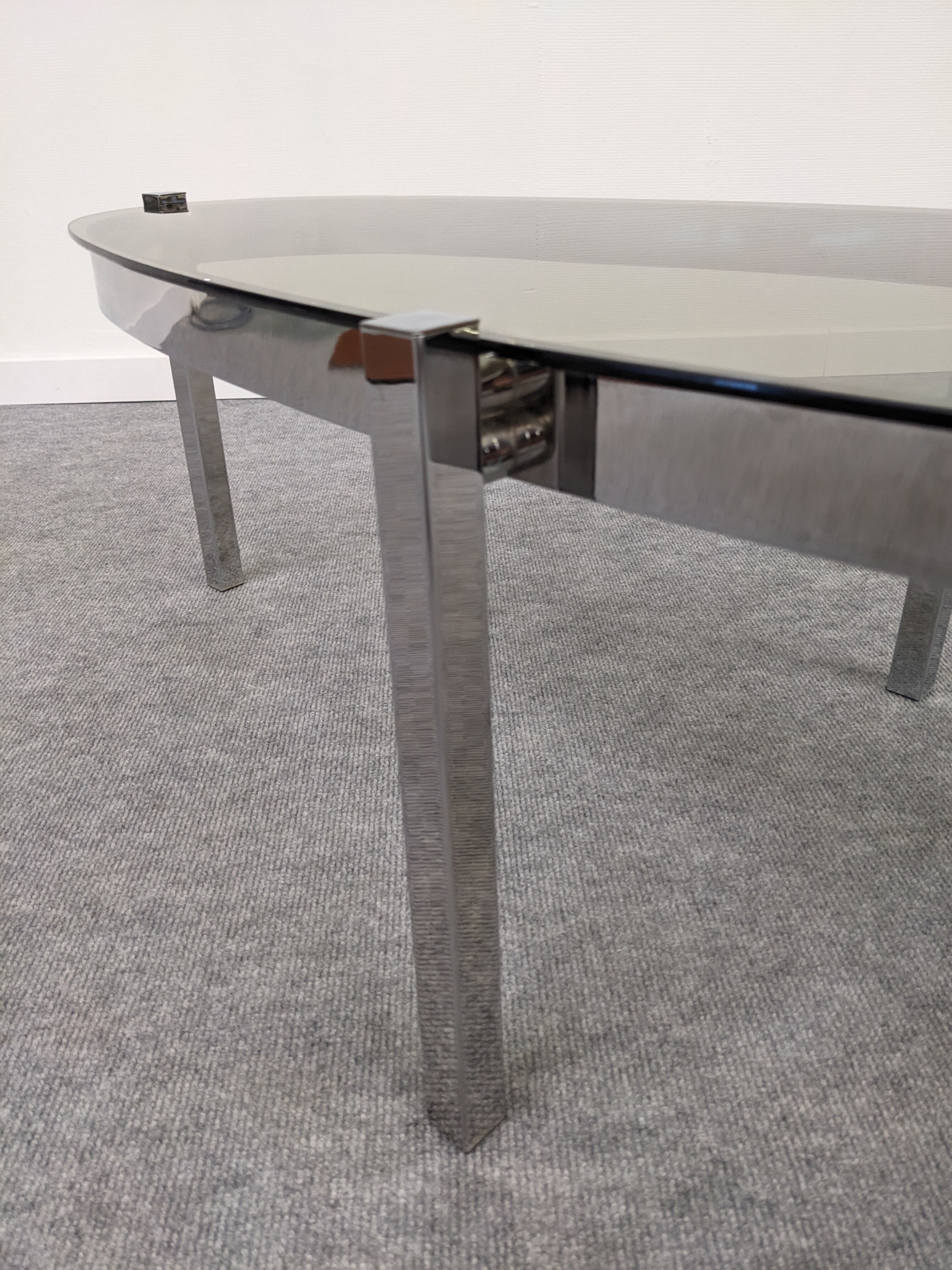 Oval smoked glass coffee table from the 60s/70s