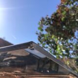 Glass and chrome metal dining table