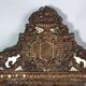 Antique brass repoussé mirror with wooden backing, 59x31 cm, C831.