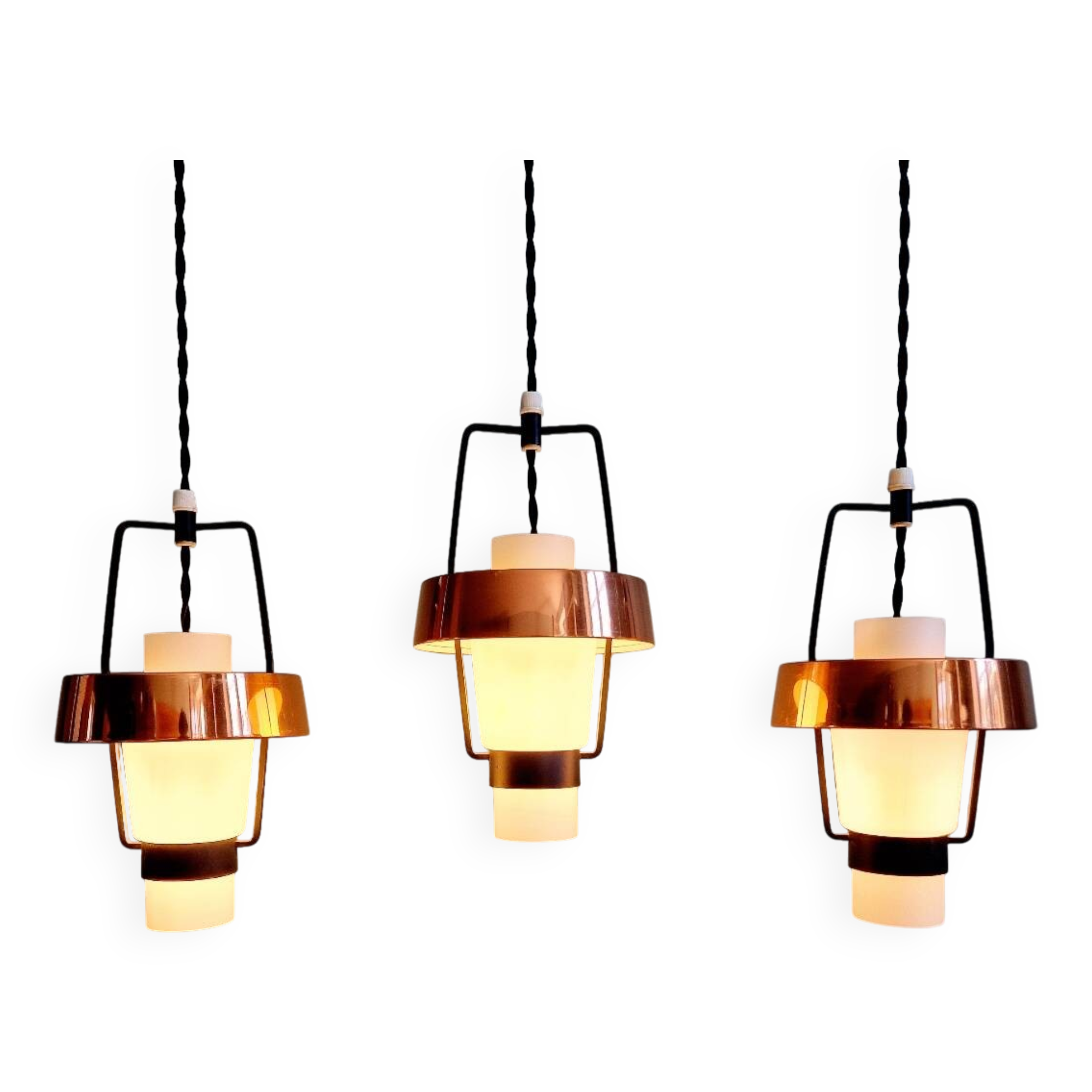 Trio of Scandinavian pendant lights in opaline and copper metal, 1960s