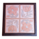 Ceramic tile trivet with floral patterns in pastel tones.