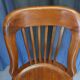 Swivel American chair in walnut and cast iron