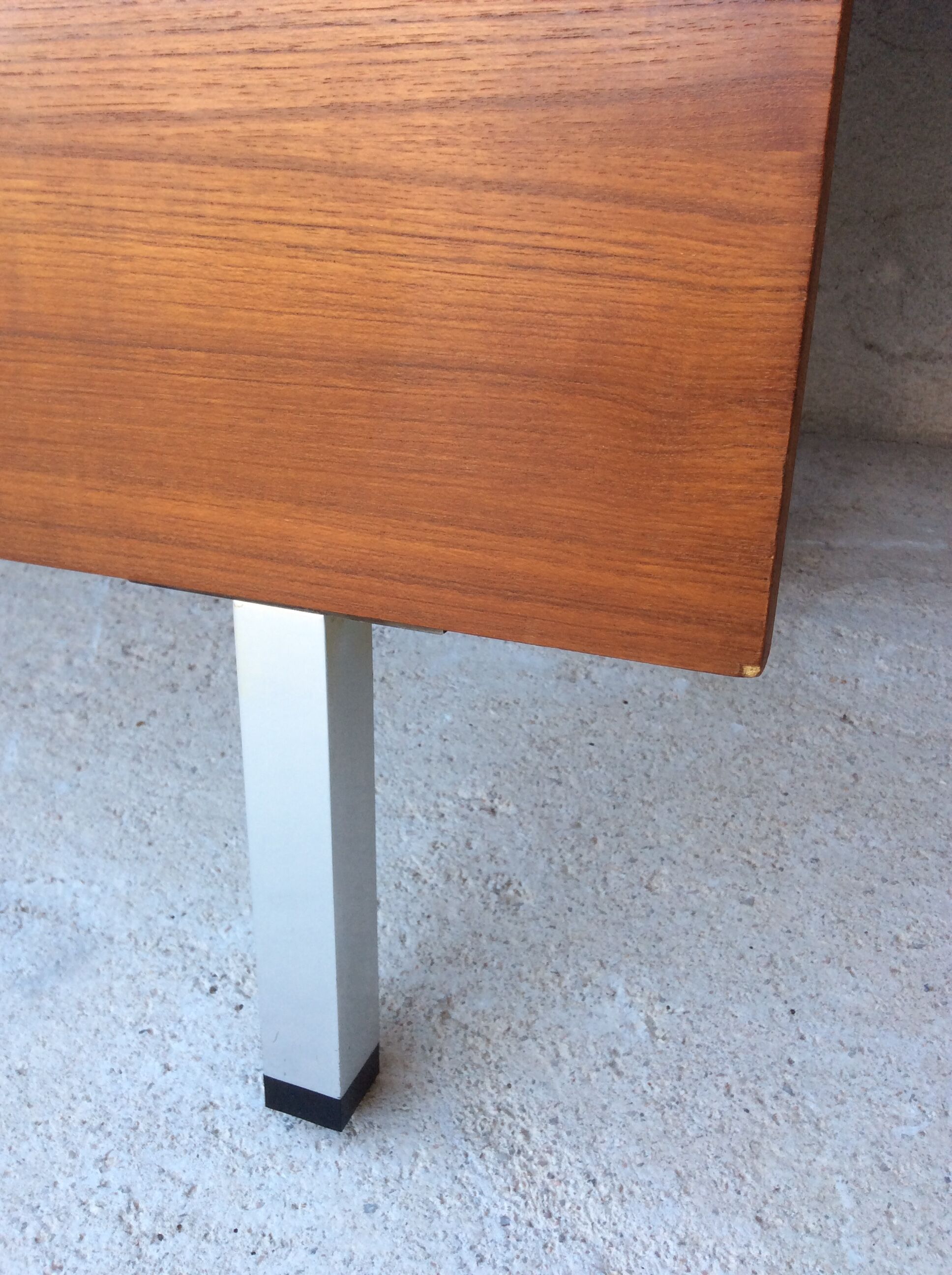 Scandinavian-style teak bed with integrated nightstands