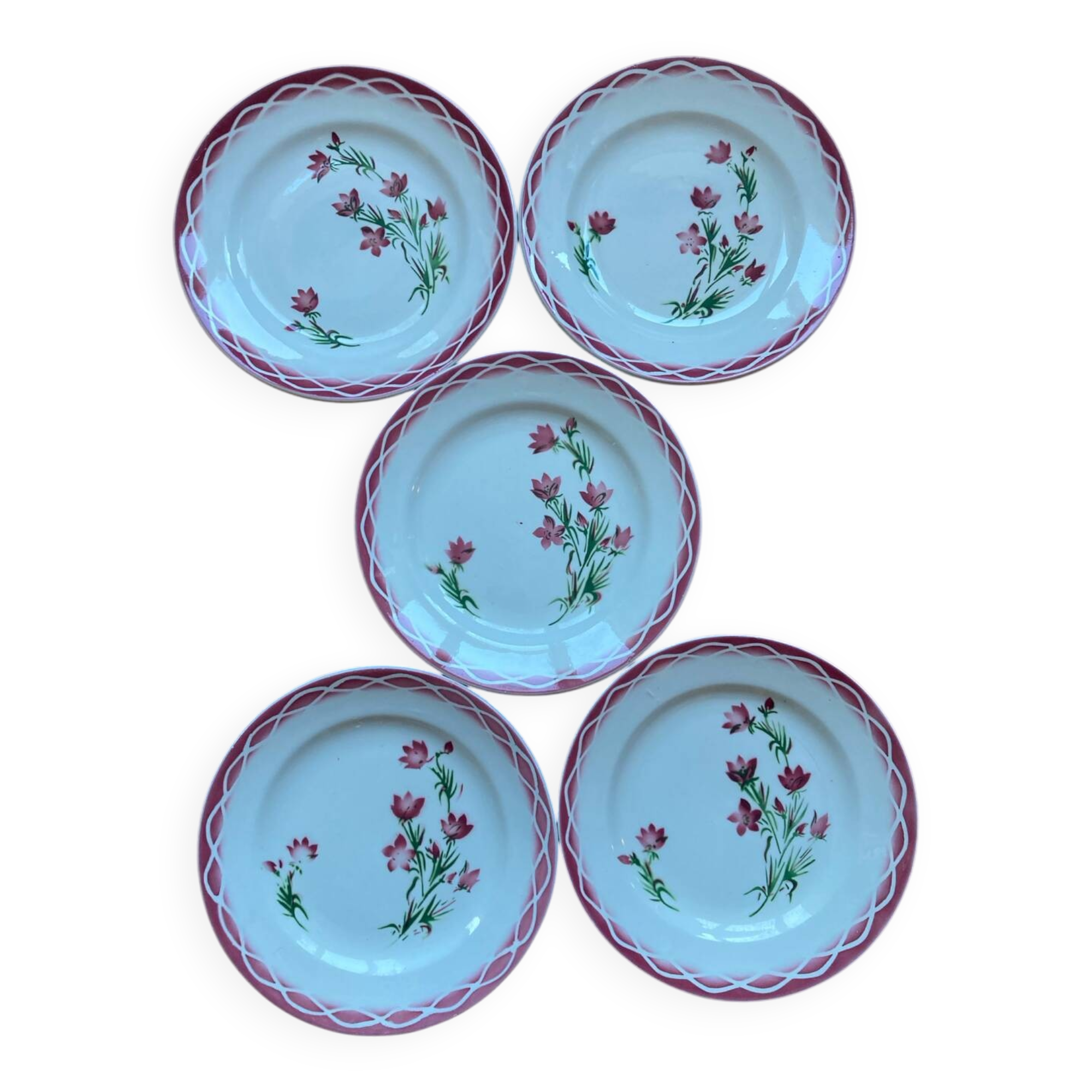 Flat plates Aude Sarreguemines with a rose flower design.