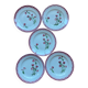 Flat plates Aude Sarreguemines with a rose flower design.